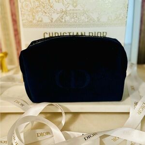 Dior Dark blue and gold velvet cosmetics pouch.